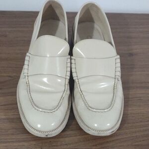 CHANEL Cream Patent Leather Penny Loafers
